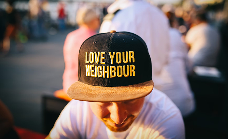 Love your neighbour hat